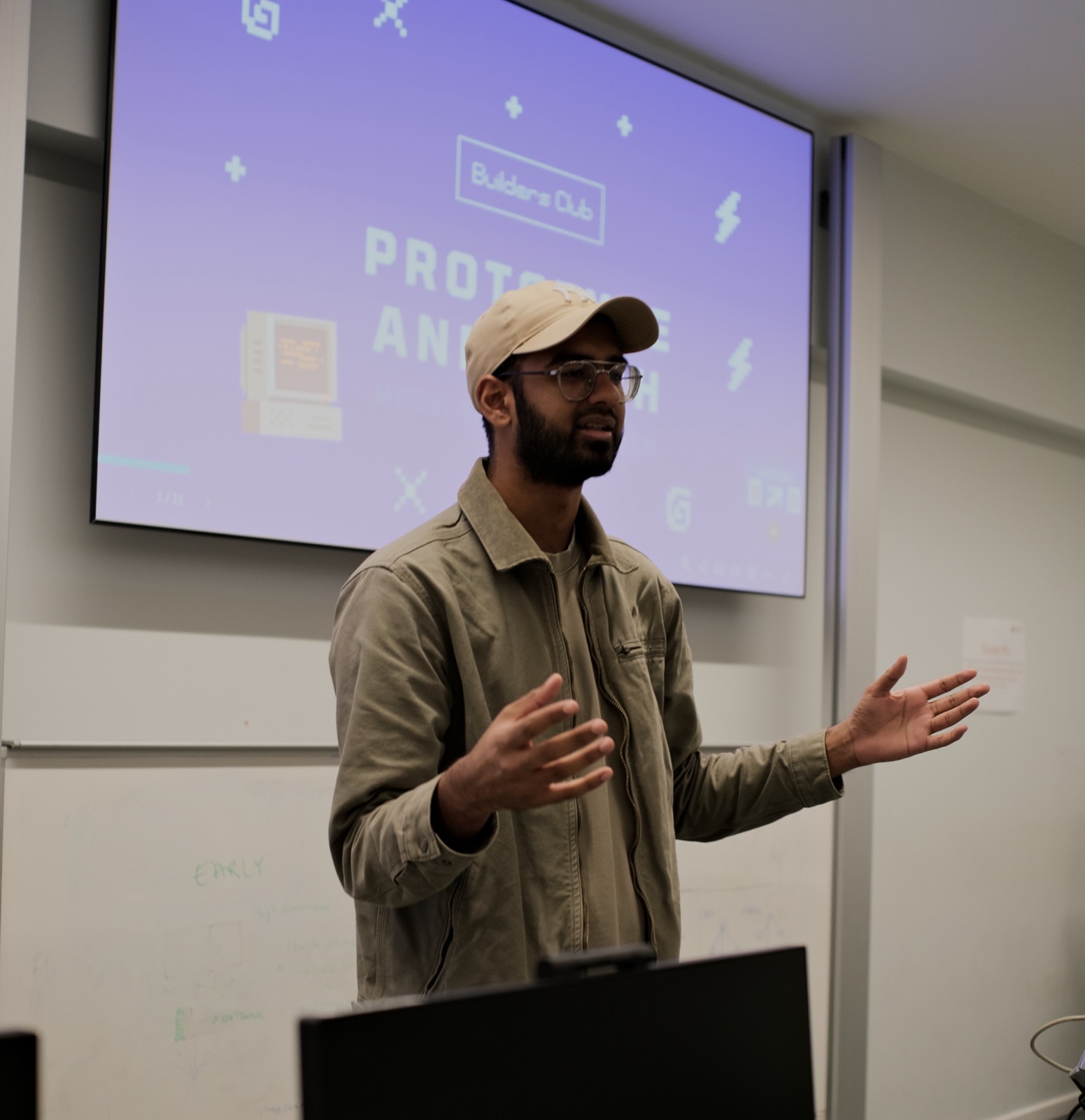 A member presenting to the room at a Builders Club kickoff