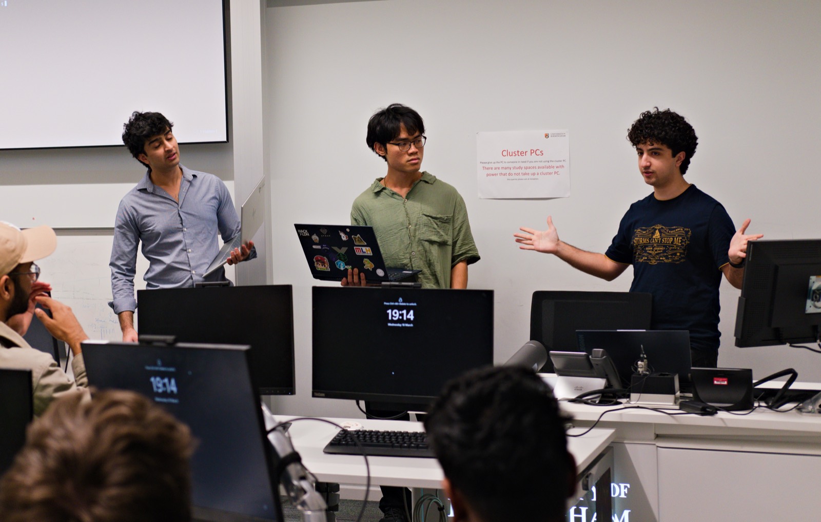 A team presenting their prototype to the room